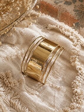 Stylish Shiny Aldo Gold Slip On Bangle Bracelet With Cut Outs